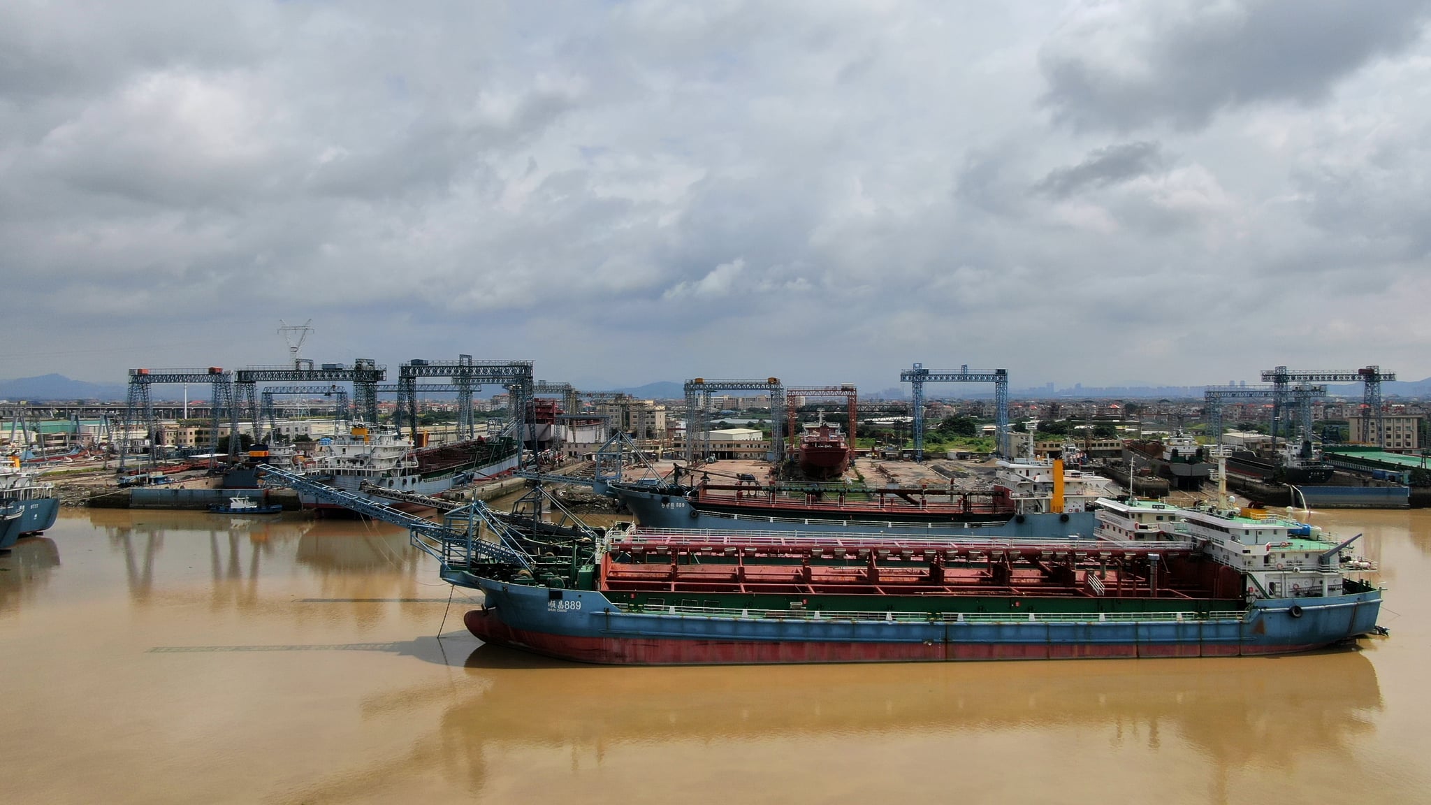 Barge and vessels at a river port